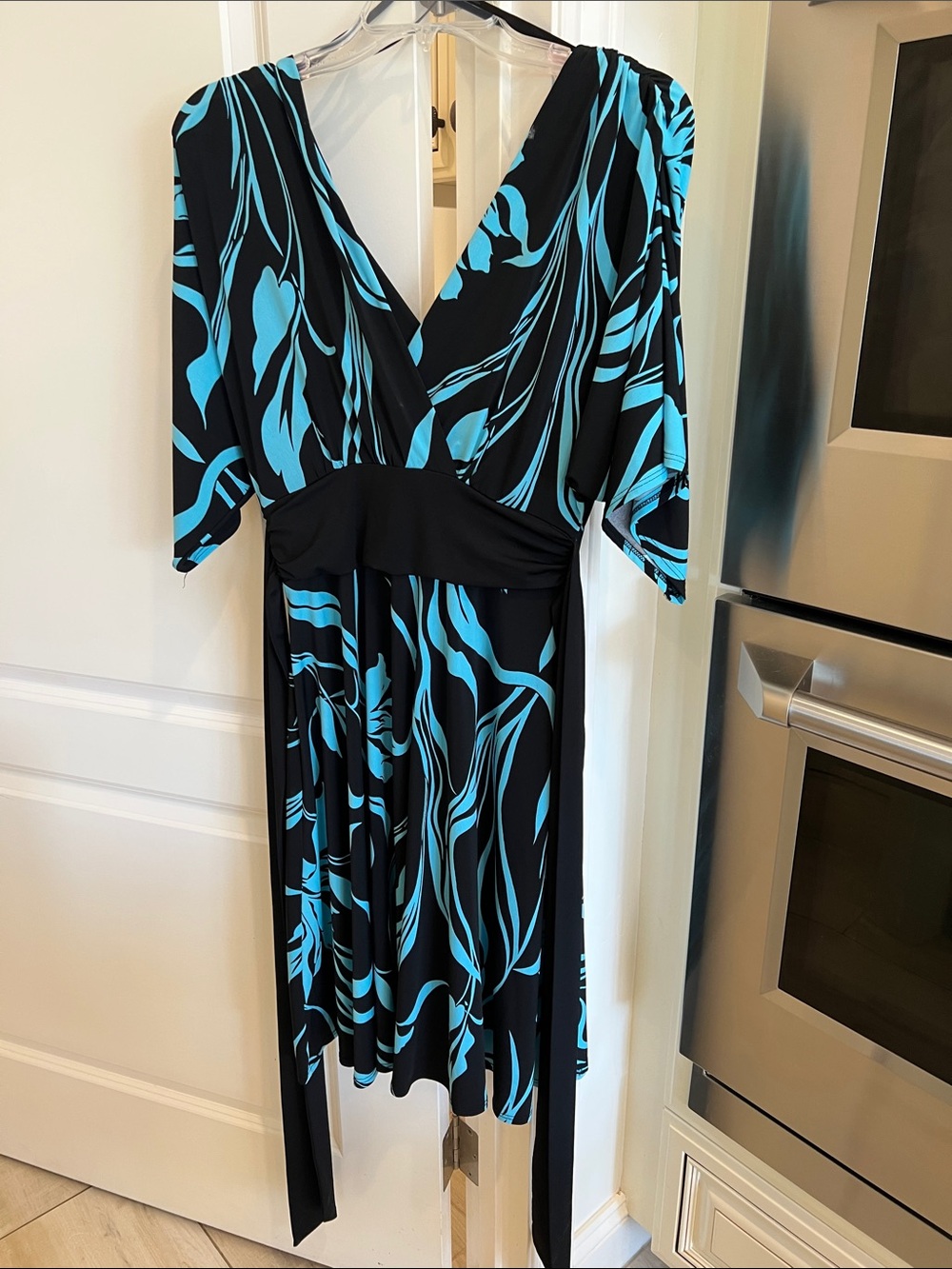 Roulette Black and Turquoise Abstract Wrap Dress